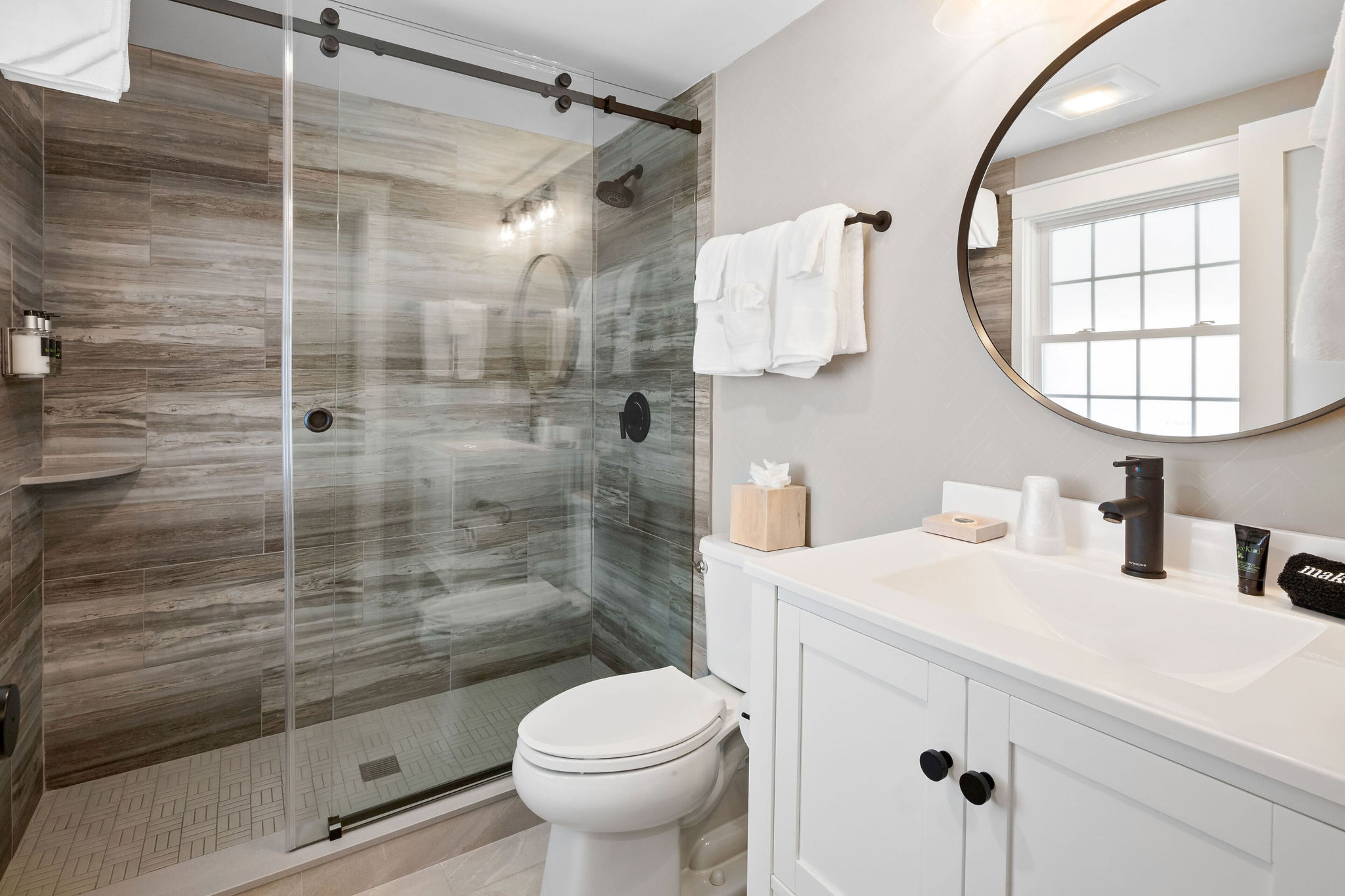 pelham 1 king + balcony + sleeper | bathroom | shower, designer toiletries, hair dryer, towels