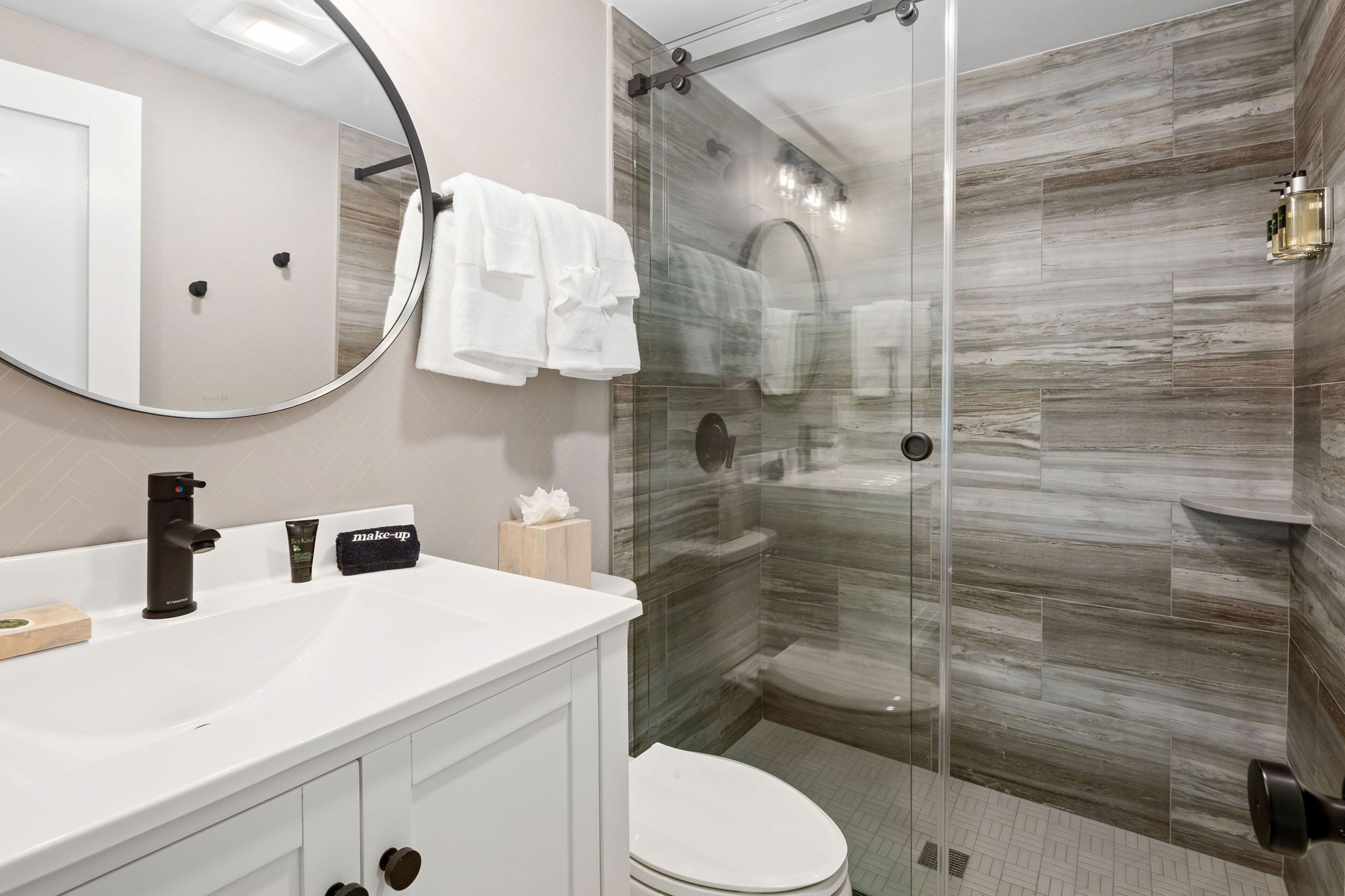 pelham king bunk suite + balcony | bathroom | shower, designer toiletries, hair dryer, towels