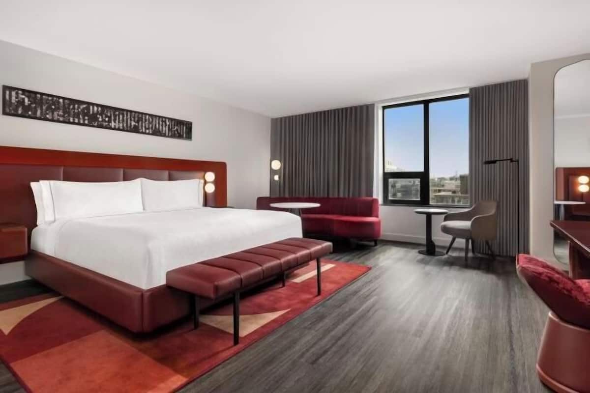 Premium bedding, down duvets, in-room safe, desk