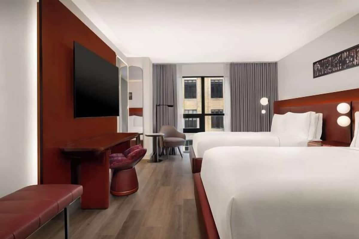 Premium bedding, down duvets, in-room safe, desk