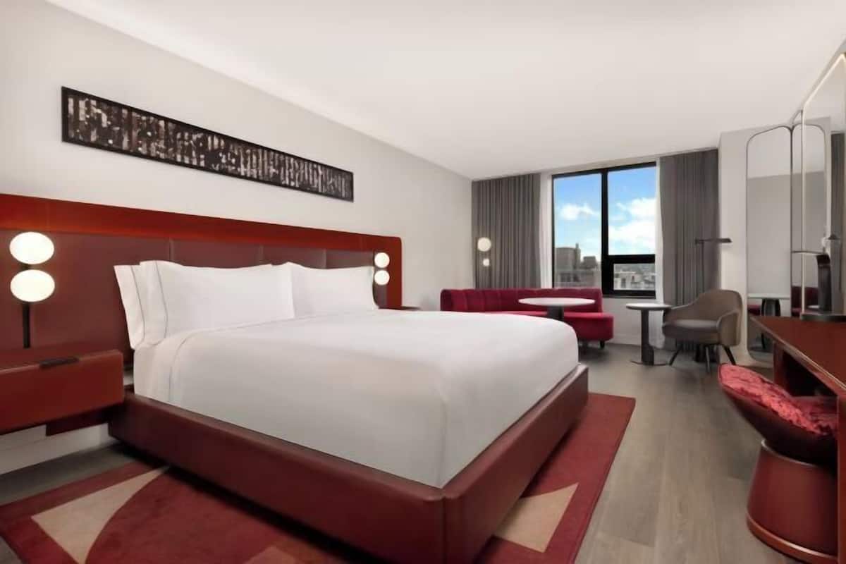 Premium bedding, down duvets, in-room safe, desk