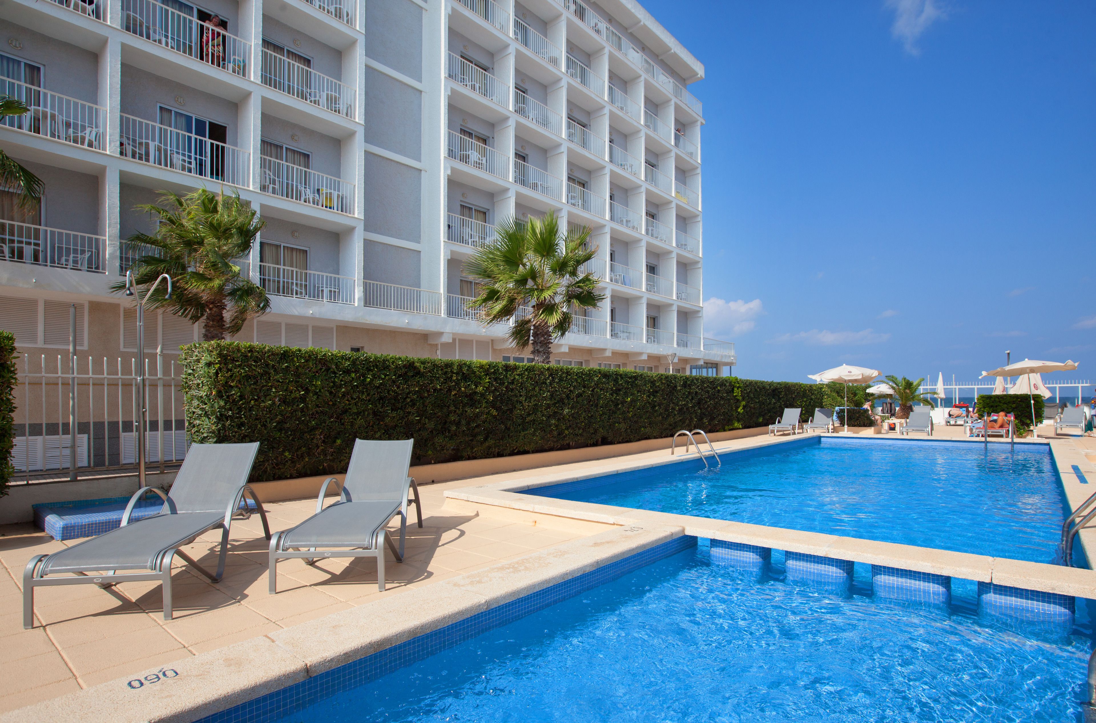 seasonal outdoor pool, pool umbrellas, pool loungers