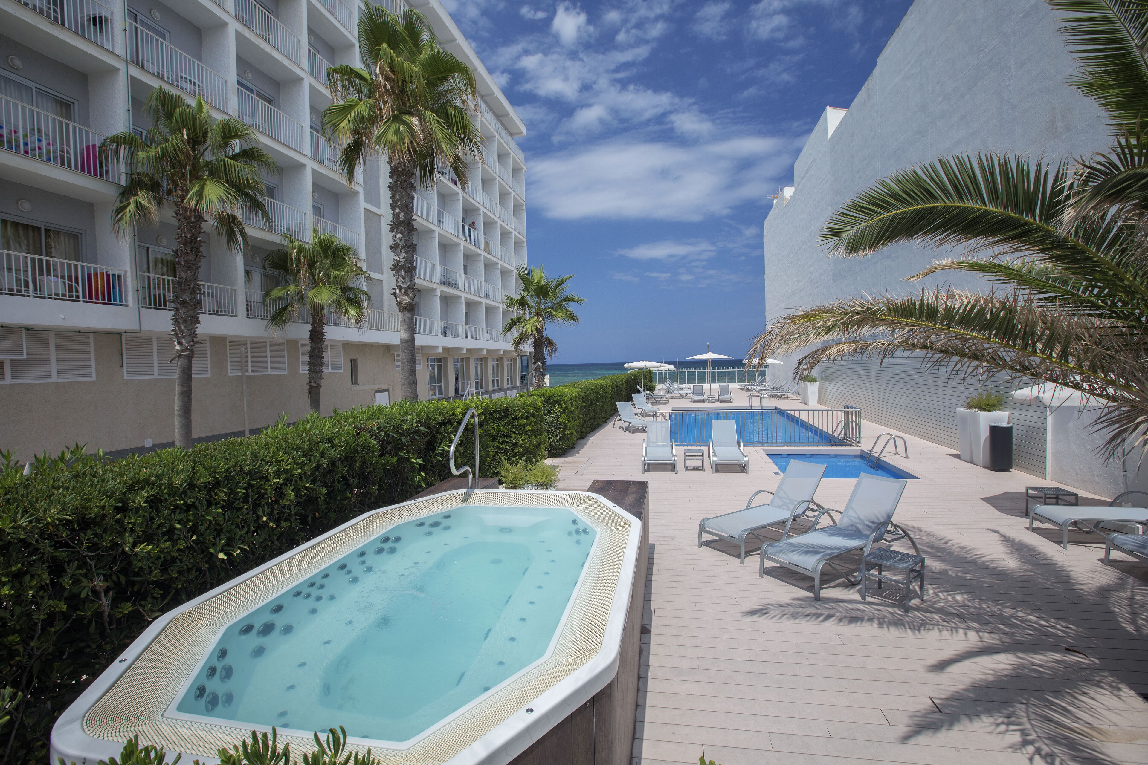 seasonal outdoor pool, pool umbrellas, pool loungers