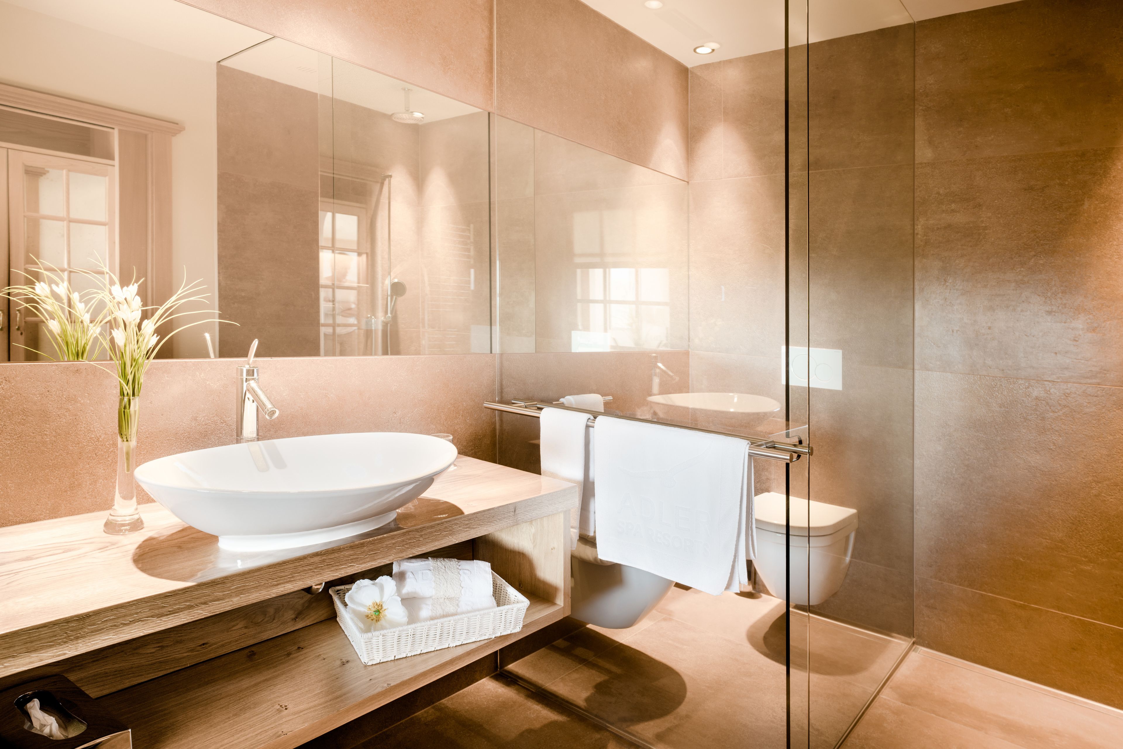 designer toiletries, hair dryer, bathrobes, bidet