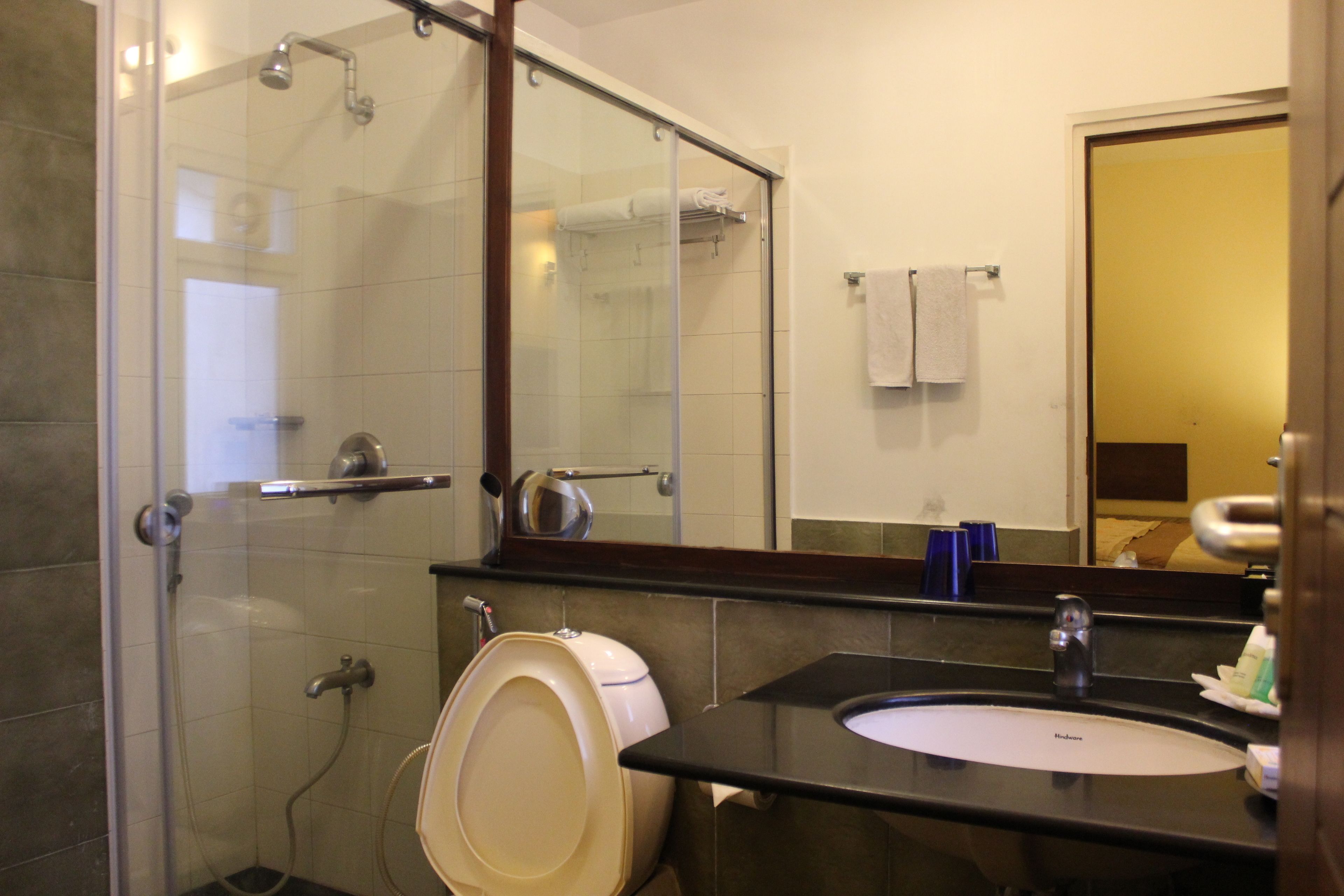 studio room | bathroom | shower, free toiletries, hair dryer, bathrobes