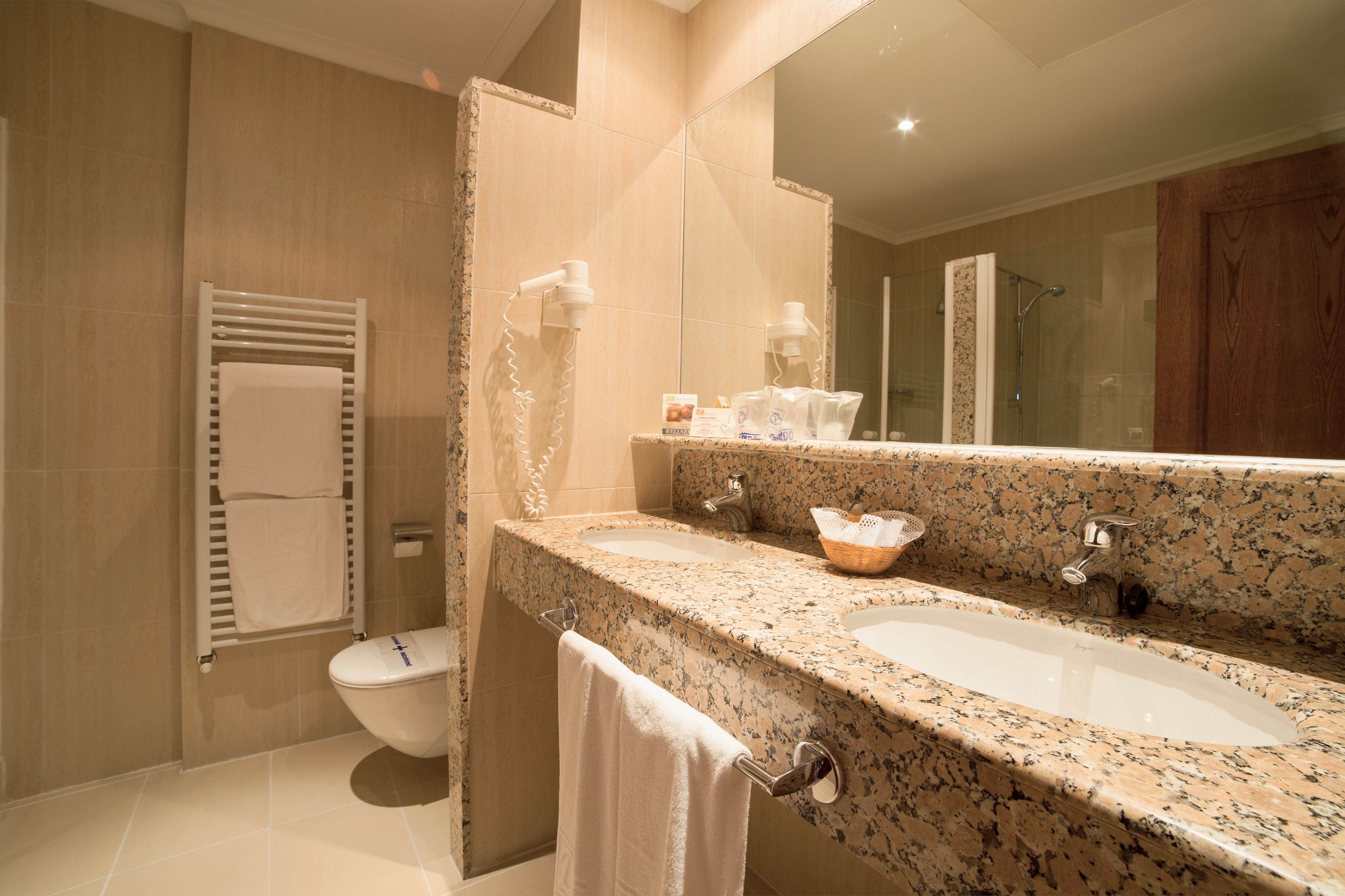 deep-soaking bathtub, free toiletries, hair dryer, towels