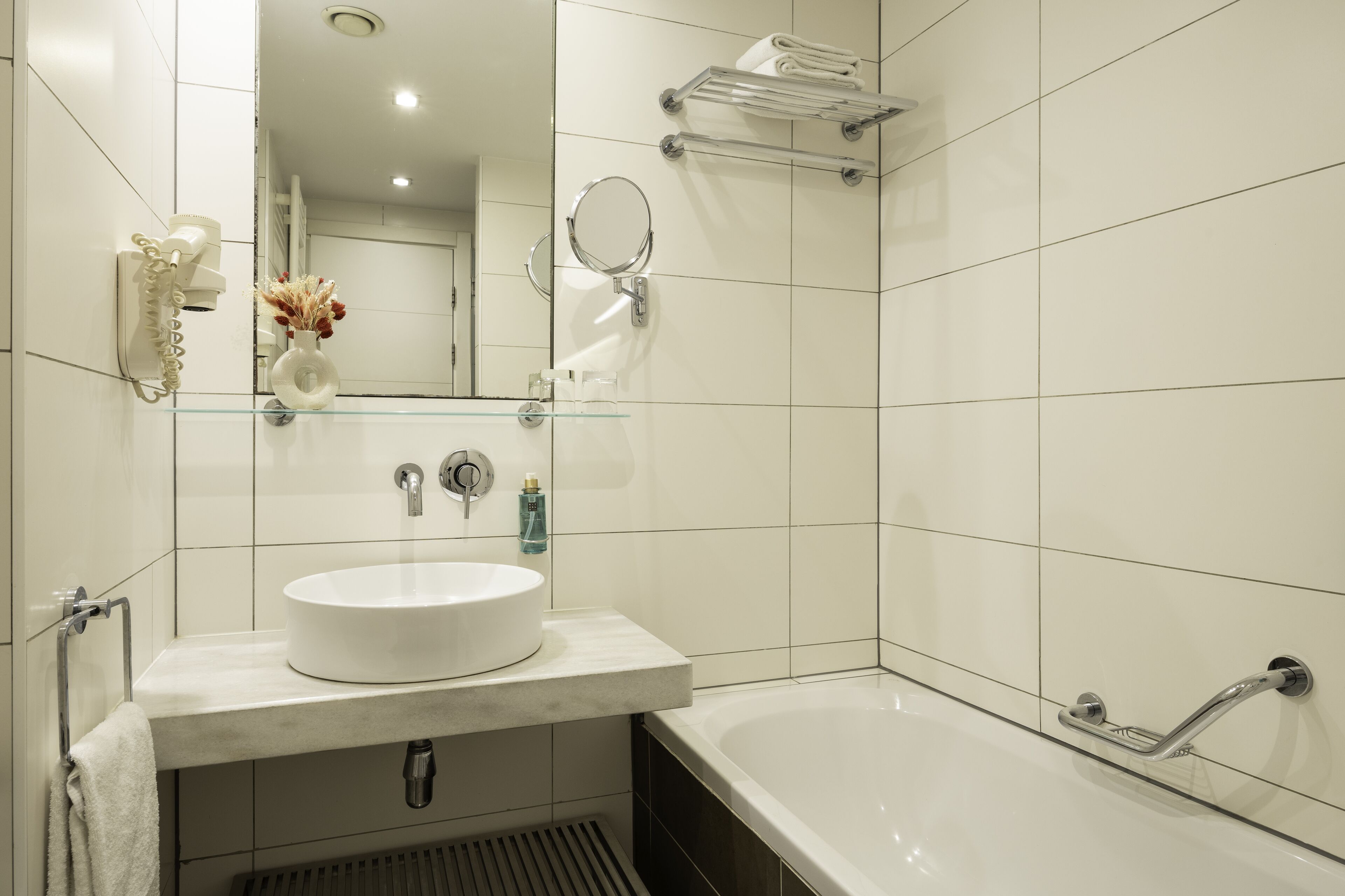 rainfall showerhead, designer toiletries, hair dryer, towels