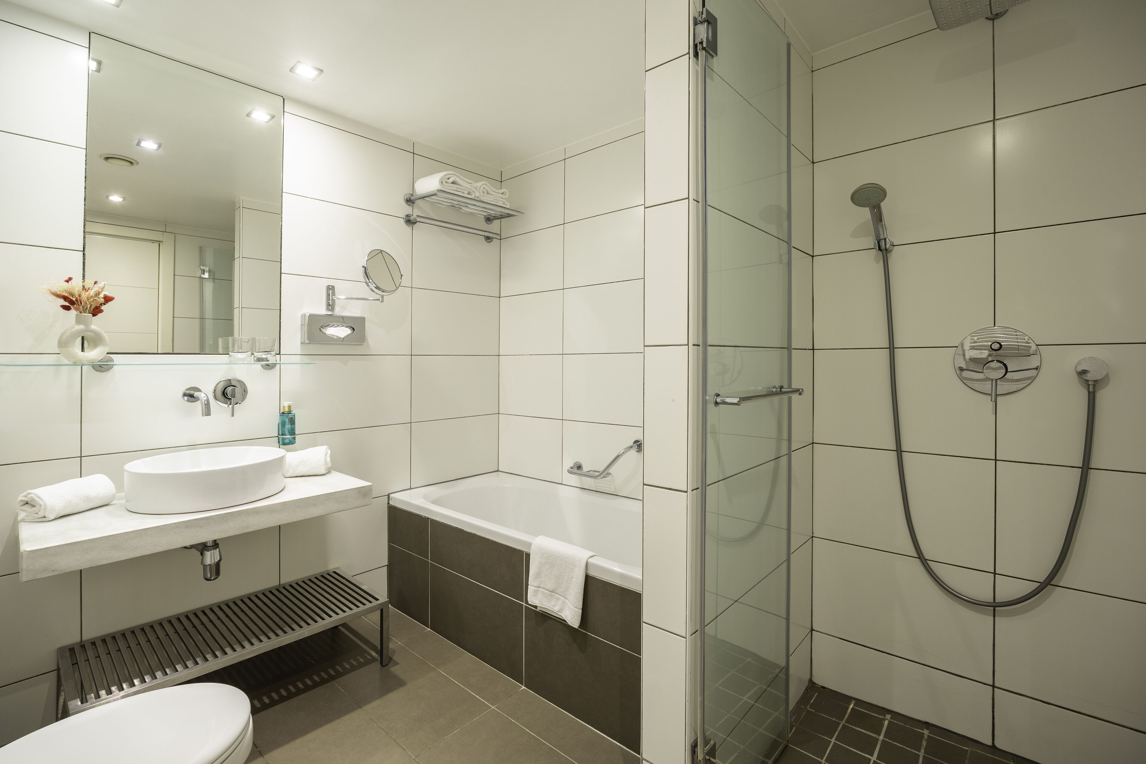 rainfall showerhead, designer toiletries, hair dryer, towels