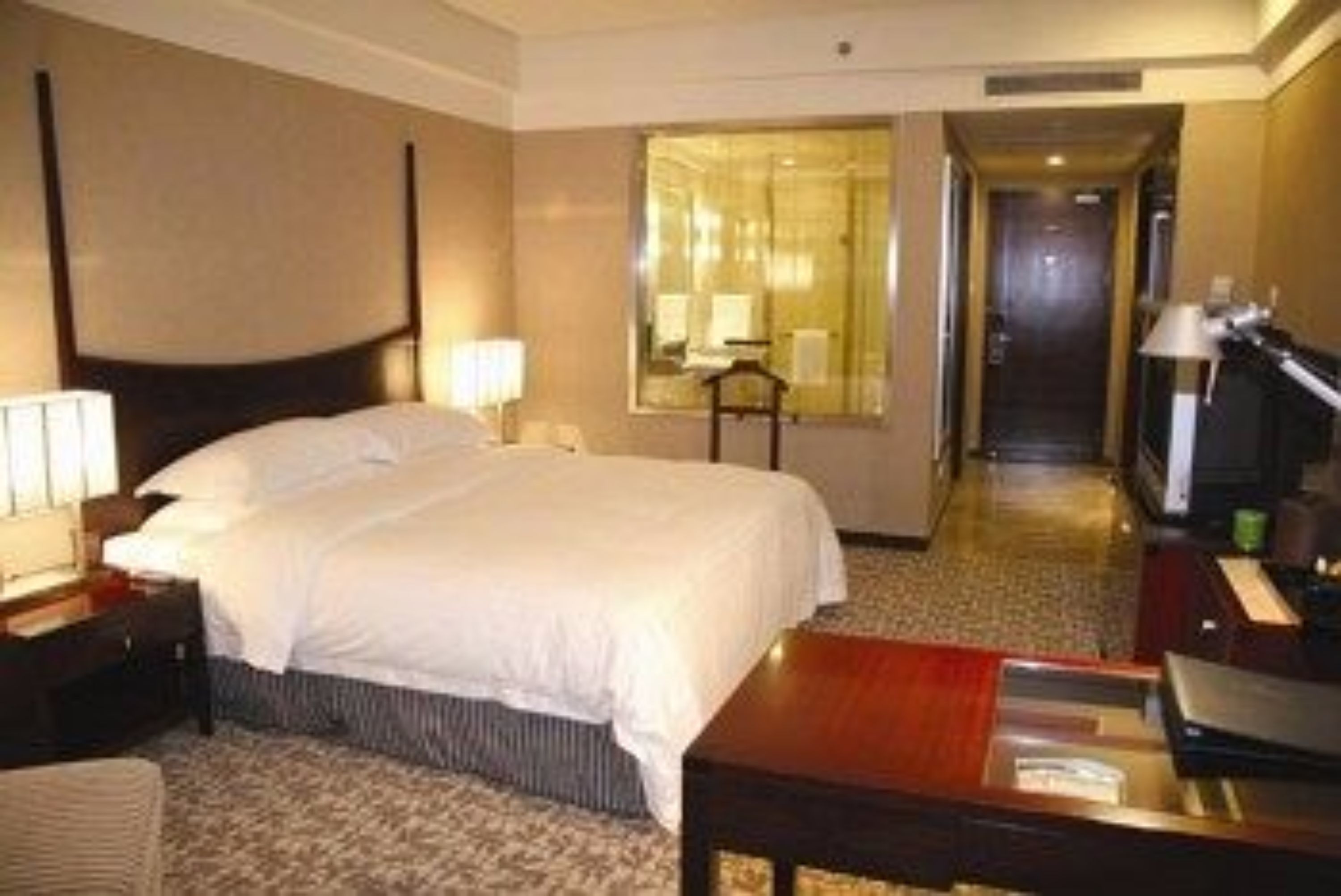 deluxe family room, river view | bathroom | deep-soaking bathtub, designer toiletries, hair dryer, dressing gowns