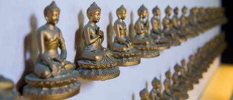 A row of golden Buddha statues.