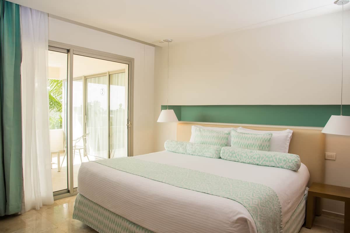 Premium bedding, free minibar items, in-room safe, desk