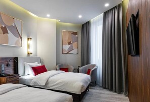 Premium Twin Room | Minibar, in-room safe, desk, soundproofing - Hotel Kazakhstan (Almaty)