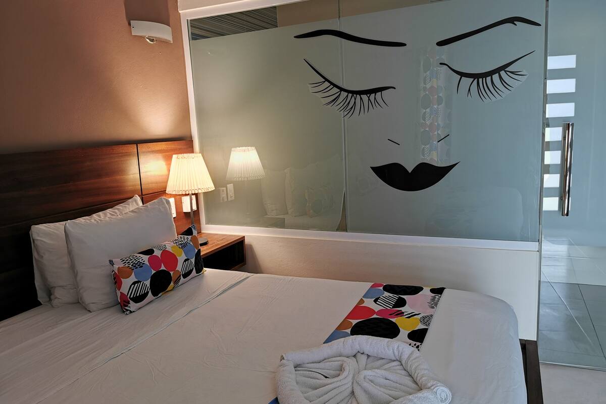 comfort double room, 1 king bed, pool access, ground floor | 1 bedroom, minibar, in-room safe, individually decorated