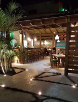 Breakfast, lunch, dinner served; international cuisine, pool views 