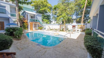 Outdoor pool, pool umbrellas, pool loungers