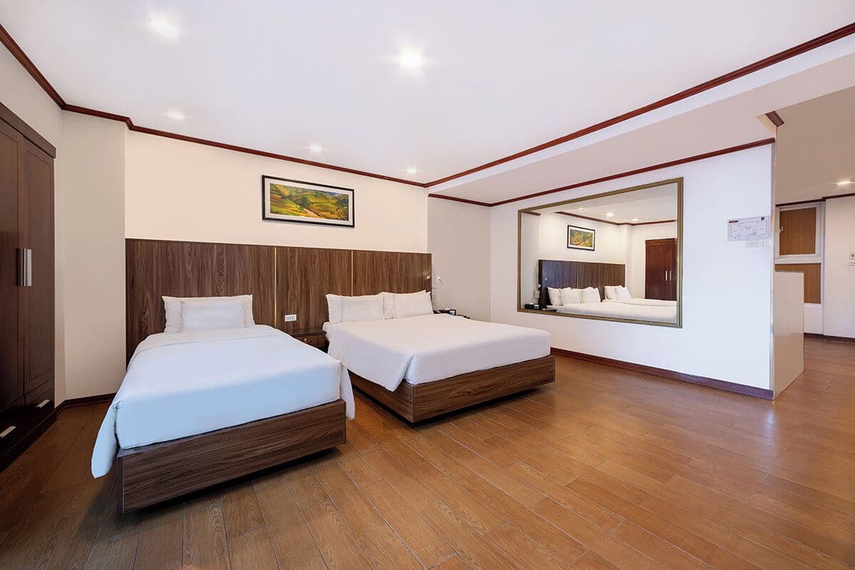 Family Room | Minibar, in-room safe, blackout drapes, iron/ironing board