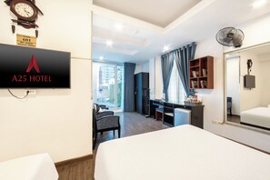 Family Room | Minibar, in-room safe, blackout drapes, iron/ironing board - A25 Hotel - 46 Chau Long (Hanoi)