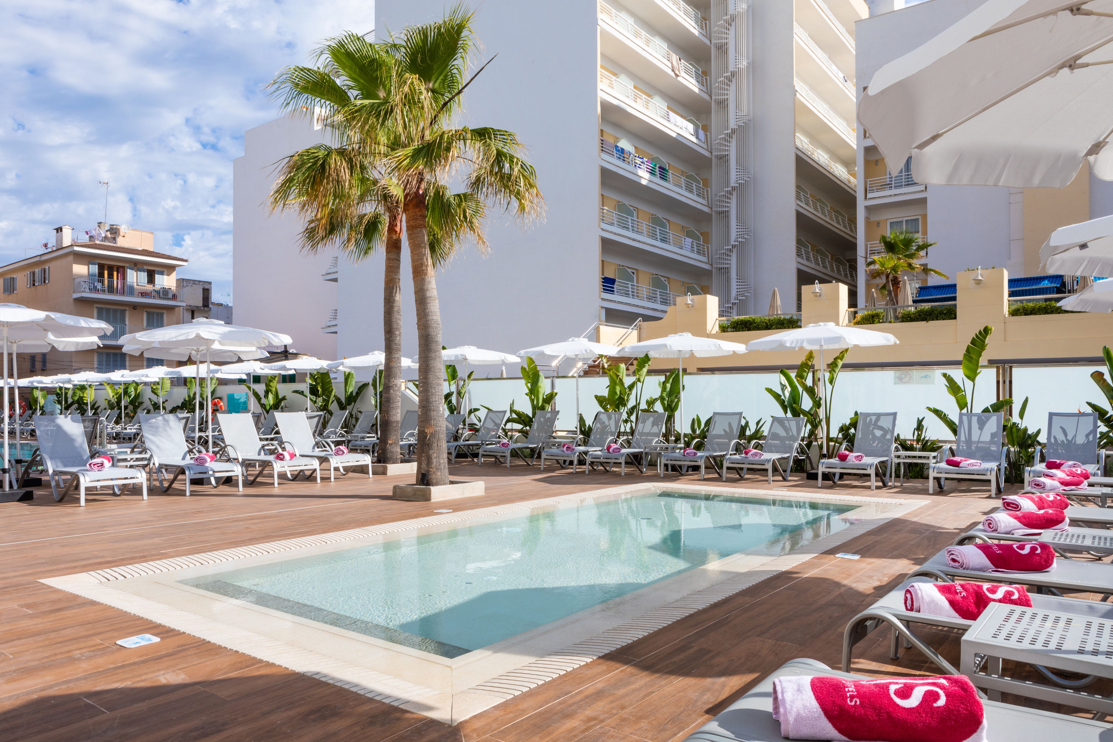 seasonal outdoor pool, pool umbrellas, pool loungers