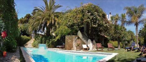 Outdoor pool, pool umbrellas, pool loungers