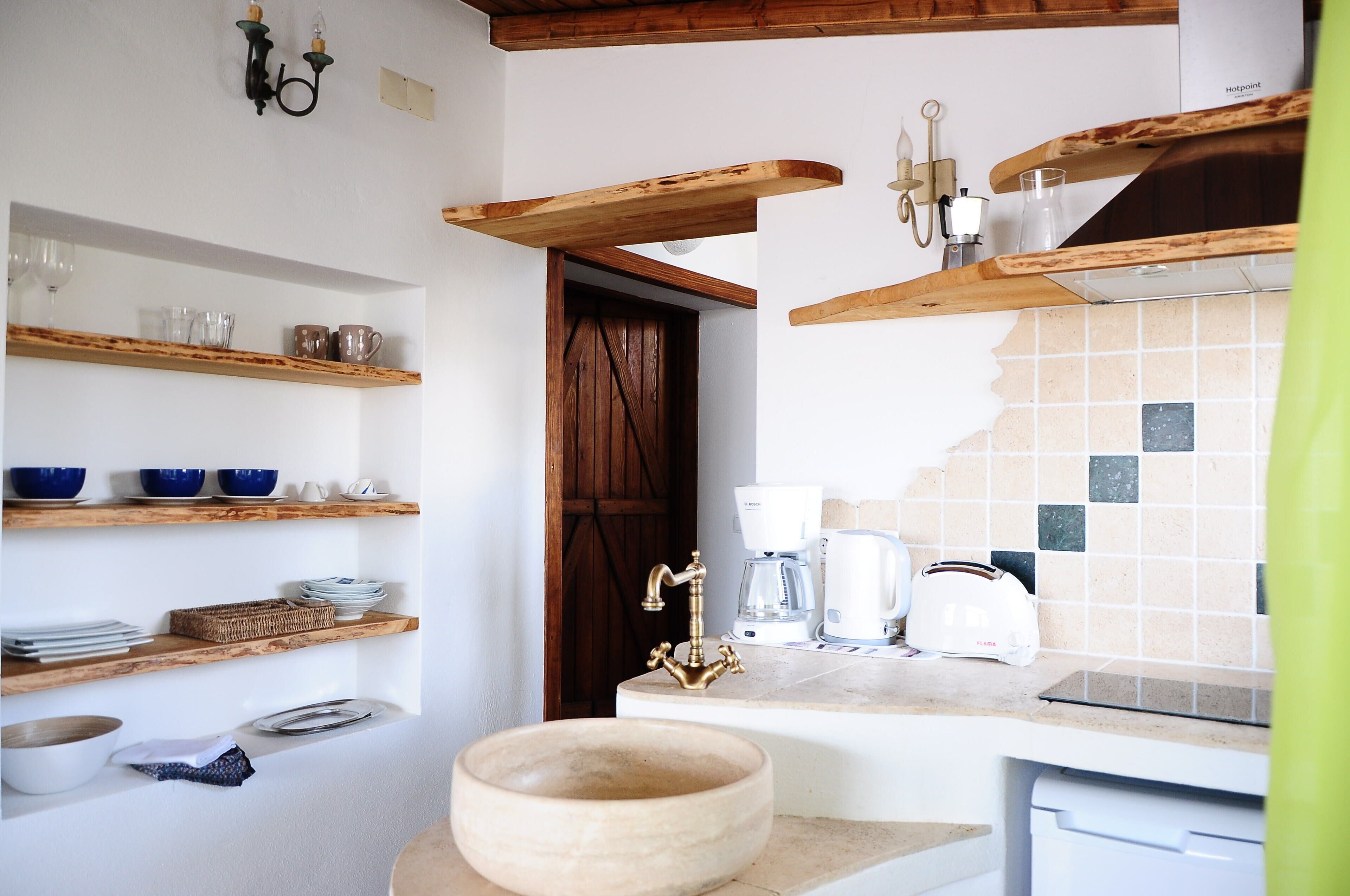 signature apartment, 1 bedroom, kitchenette, garden view | private kitchen | fridge, oven, stovetop, coffee/tea maker