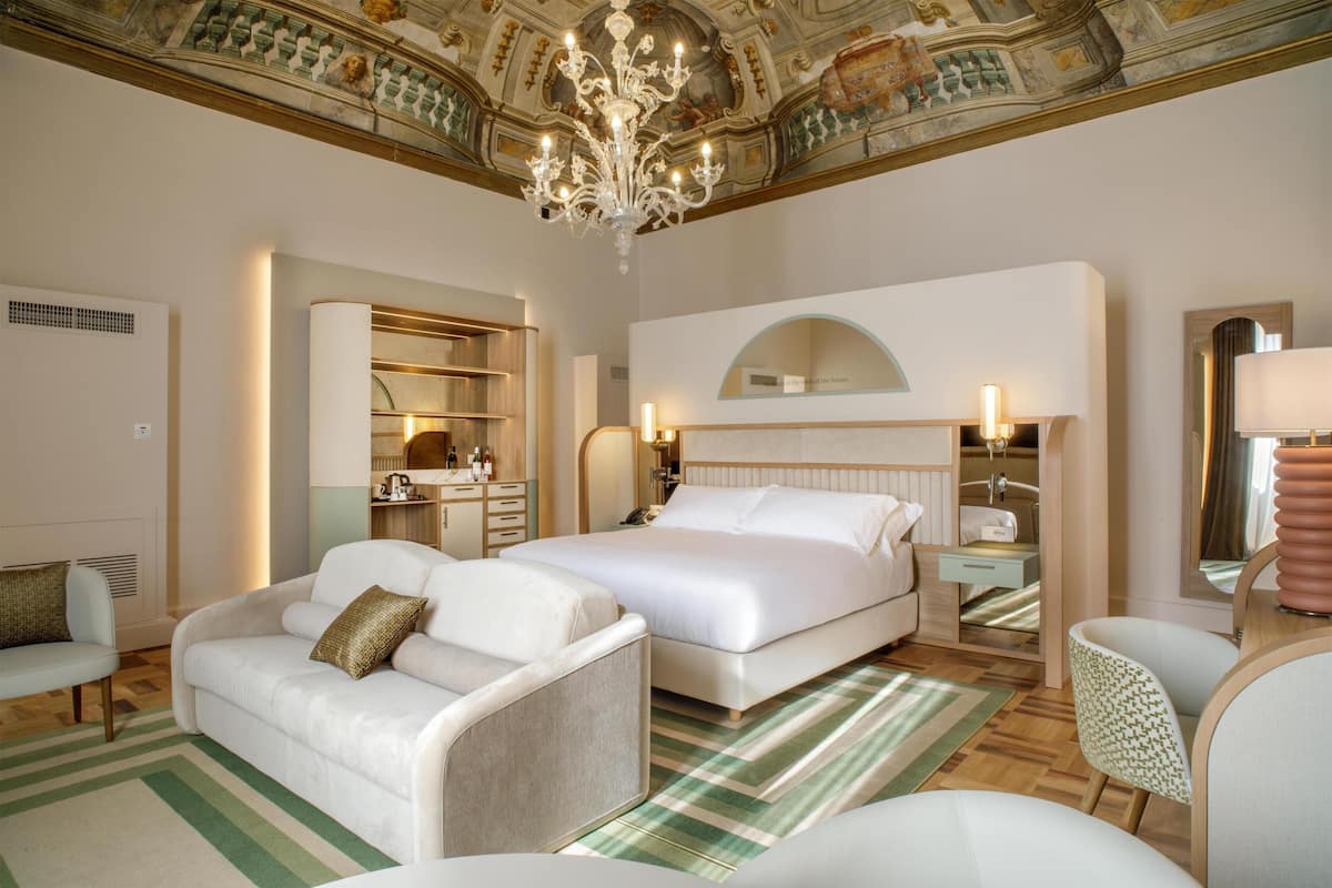 Suite, 1 King Bed (Rosetta) | Living area | 55-inch TV with satellite channels