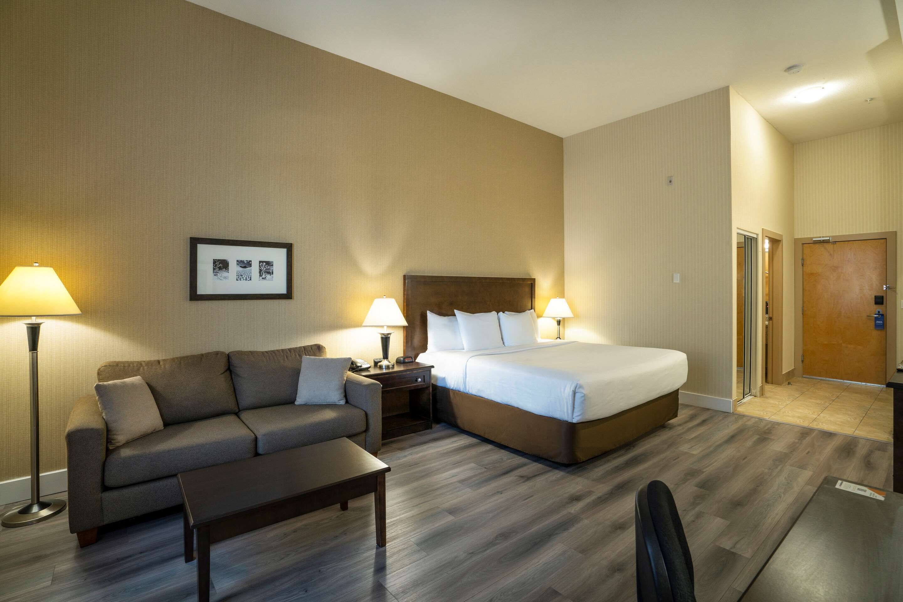 premium bedding, pillow-top beds, desk, laptop workspace