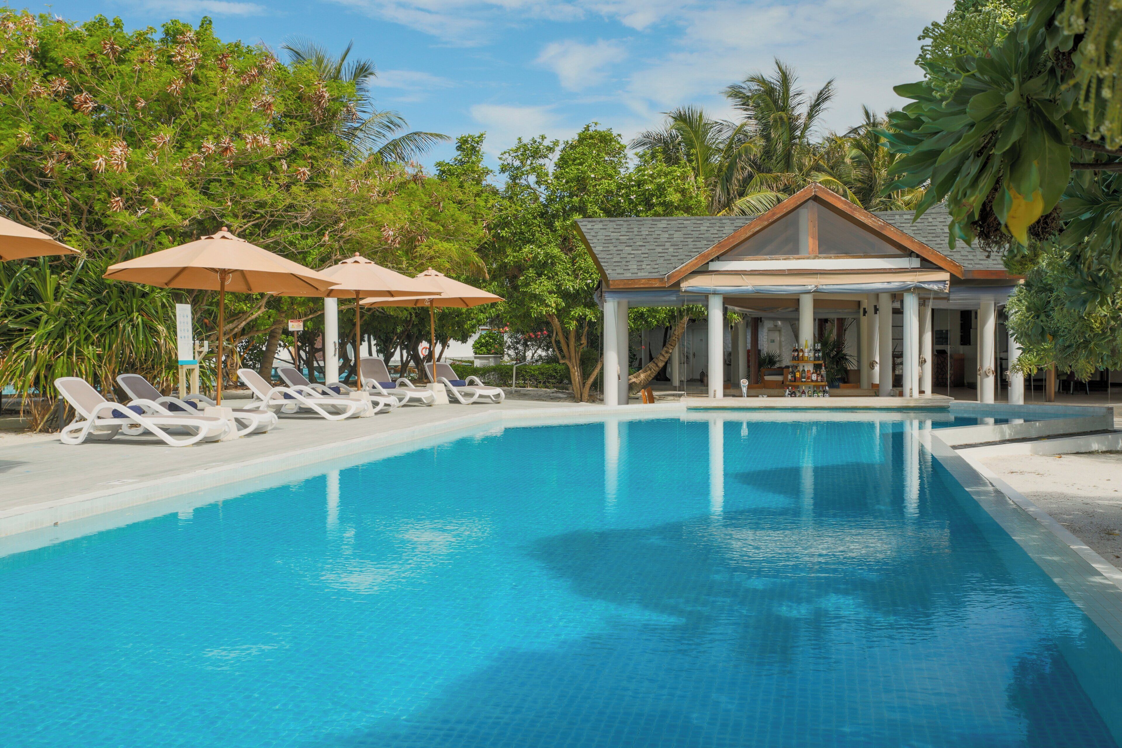 2 outdoor pools, open 7:00 AM to 7:00 PM, pool umbrellas, sun loungers