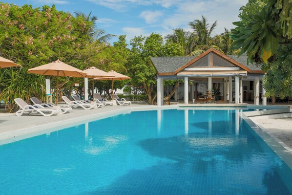 2 outdoor pools, open 7:00 AM to 7:00 PM, pool umbrellas, pool loungers