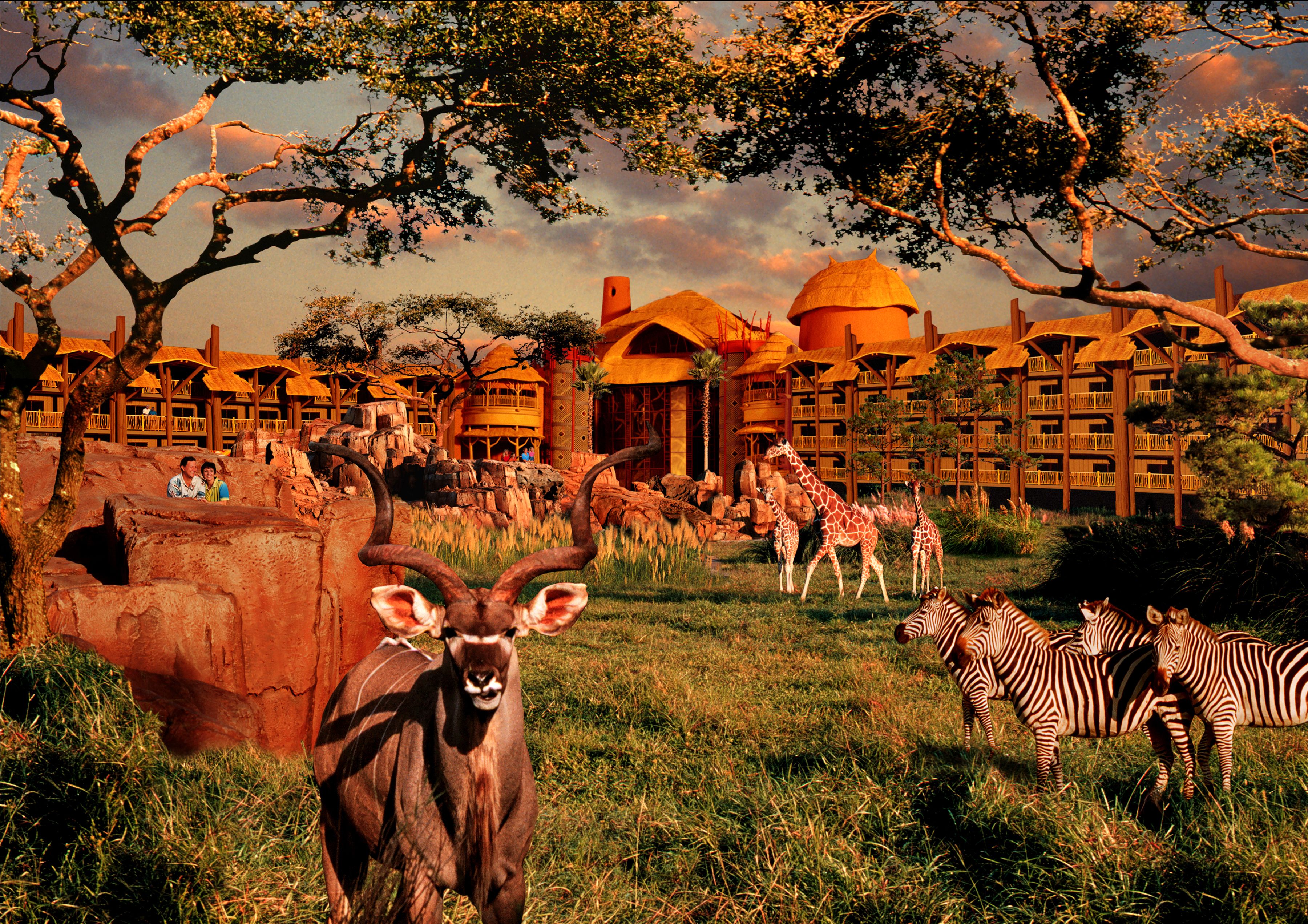 Un lodge de safari con varias estructuras de techo de paja, rodeado por un paisaje natural con jirafas y cebras.