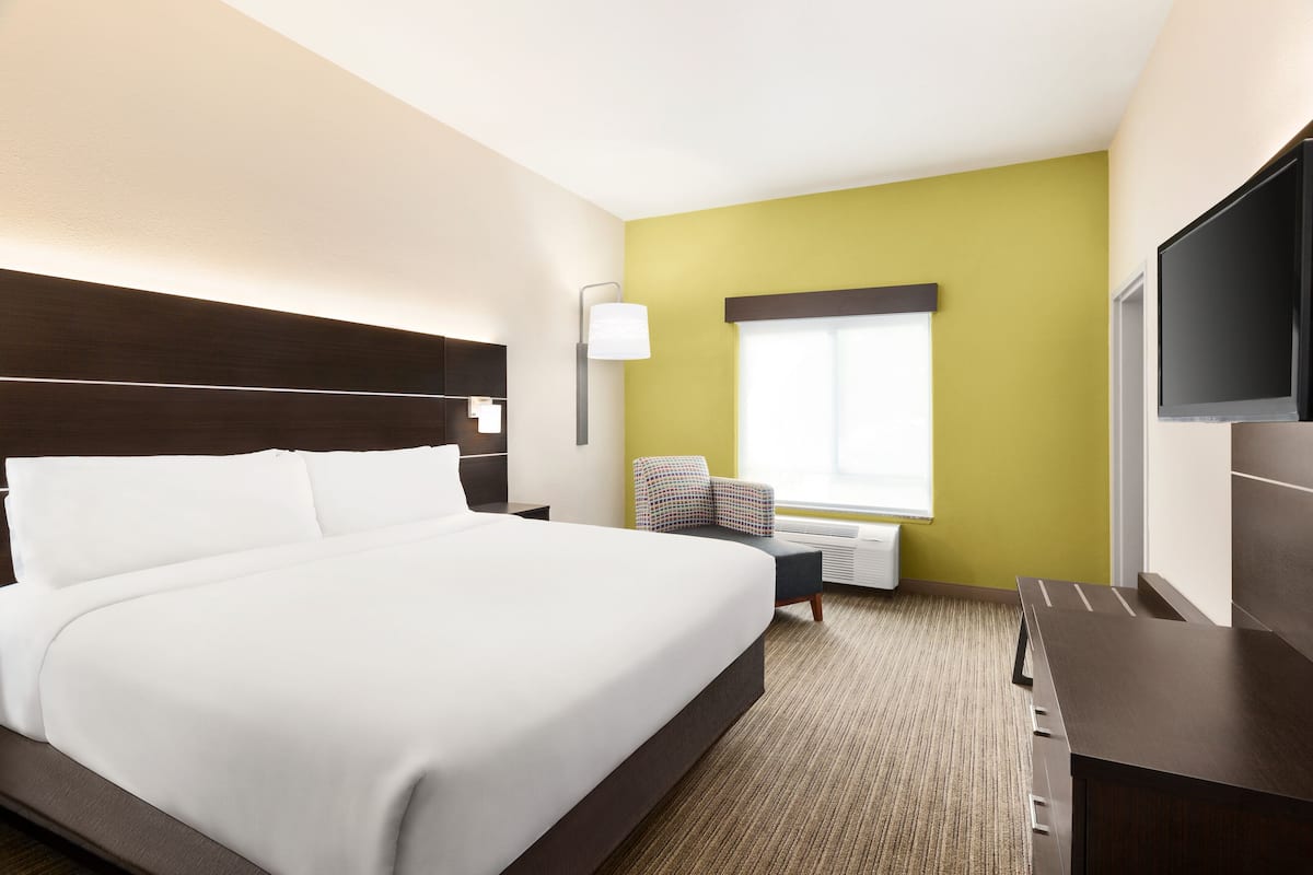 Suite, 1 King Bed with Sofa bed, Accessible (Comm, Accessible Tub) | Desk, soundproofing, iron/ironing board, free WiFi