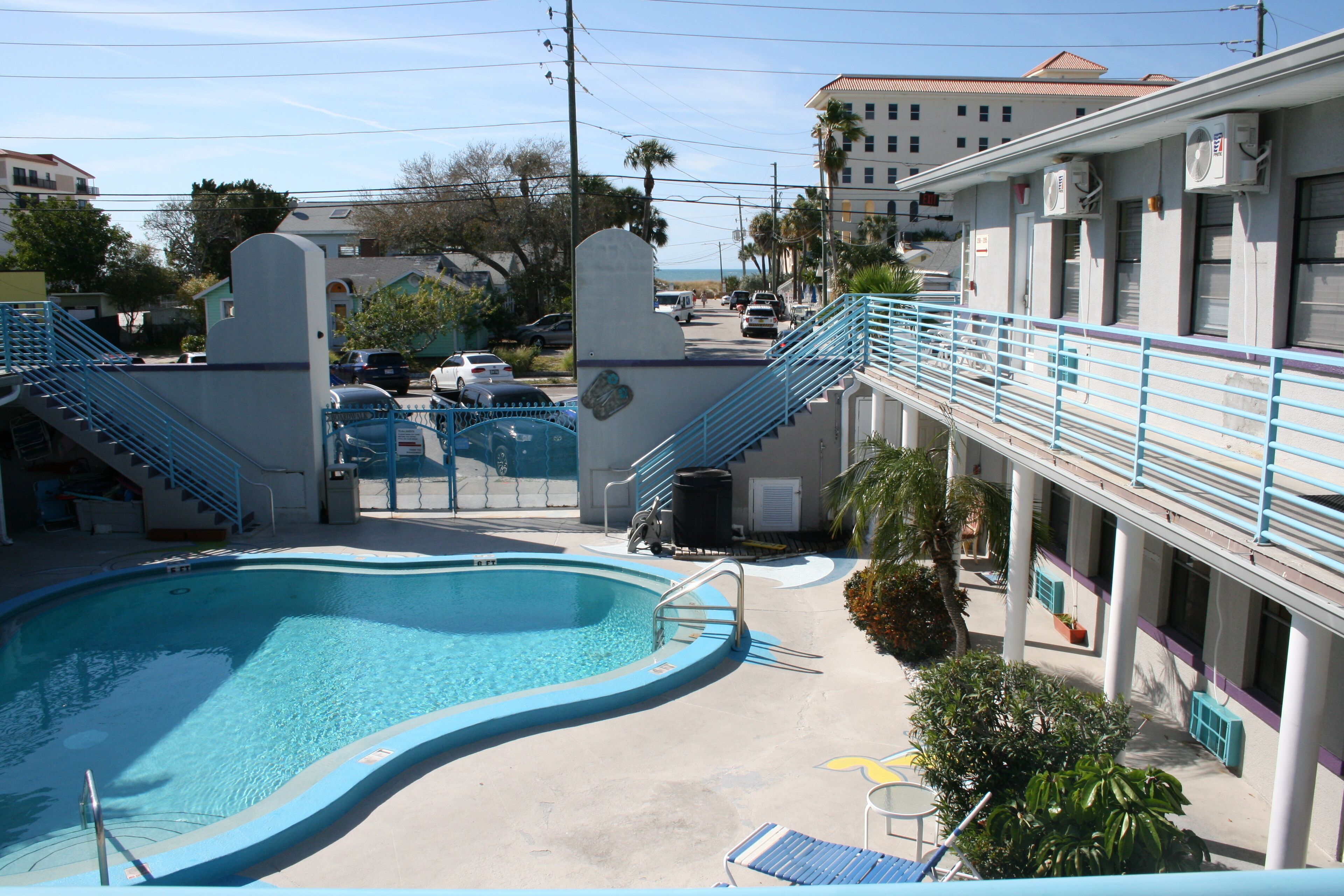 Outdoor pool, a heated pool, open 9:00 AM to 9:00 PM, pool umbrellas