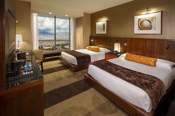A gym with treadmills, ellipticals, and weight machines. at Aliante Casino & Hotel