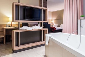 Suite, 2 lits une place, baignoire | Équipements de la chambre