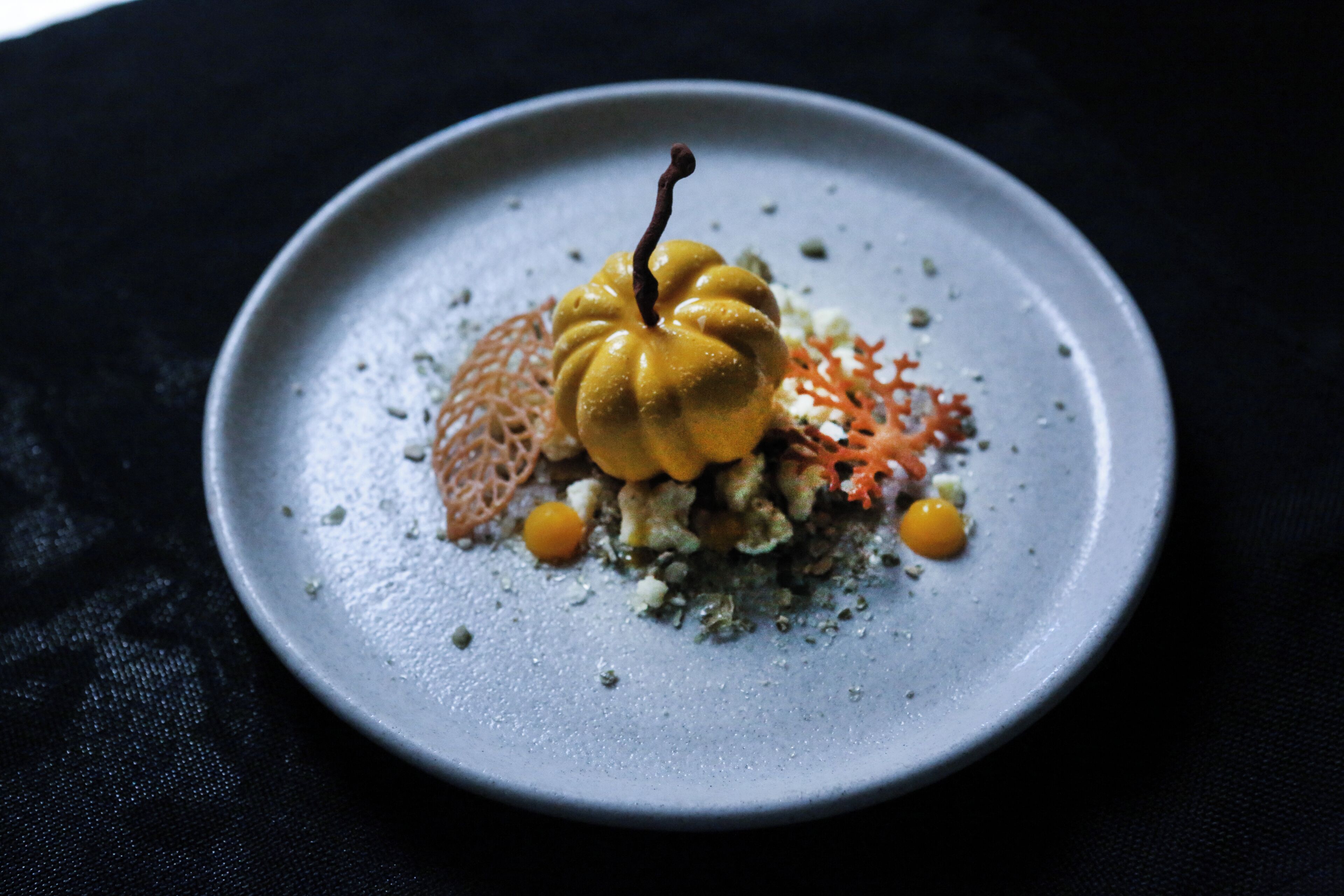 A dessert on a plate with a unique presentation.