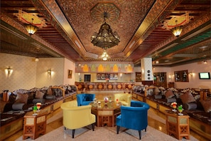 5 bars/lounges, poolside bar, beach bar