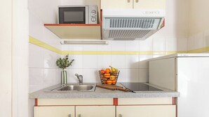 Private kitchen - Appart'City Classic Clermont Ferrand Centre (Clermont-Ferrand)