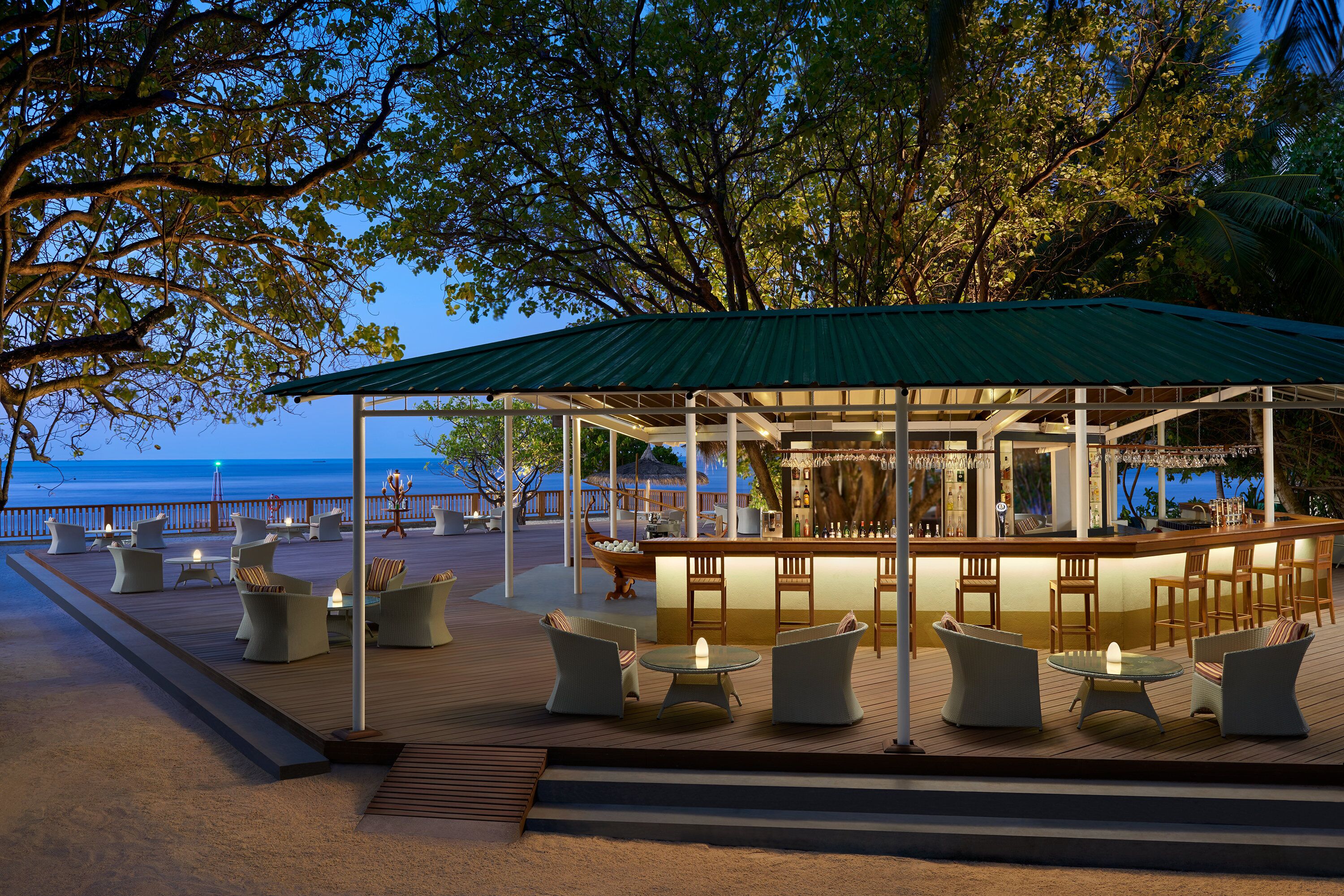 3 bars/lounges, poolside bar, beach bar