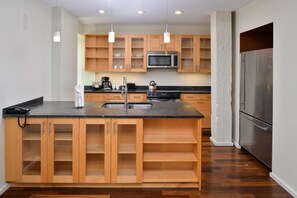 Exclusive Penthouse, 2 Bedrooms, Balcony, River View | Private kitchen | Coffee/tea maker - Grand Eastonian Hotel & Suites (Easton)