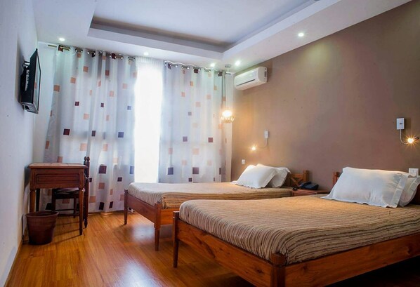 Executive Twin Room, 1 Bedroom, City View | Premium bedding, minibar, in-room safe, individually decorated