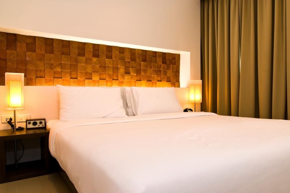 Ropa de cama de alta calidad y minibar 