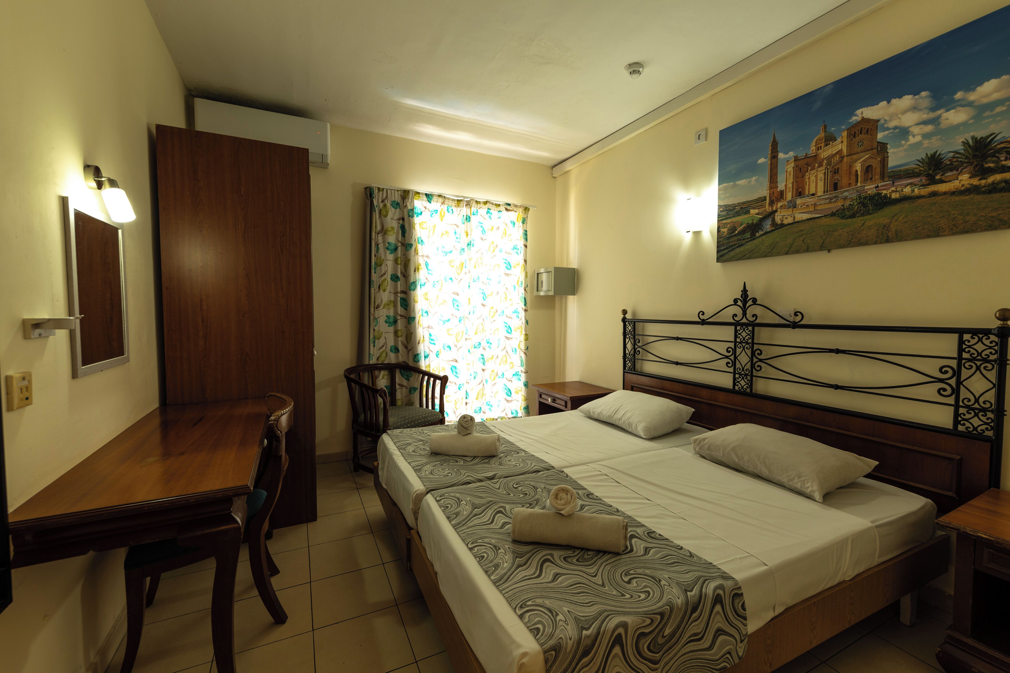In-room safe, desk, blackout curtains, iron/ironing board (on request)