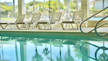 Indoor pool, 2 outdoor pools, open 8:30 AM to 8:00 PM, pool umbrellas