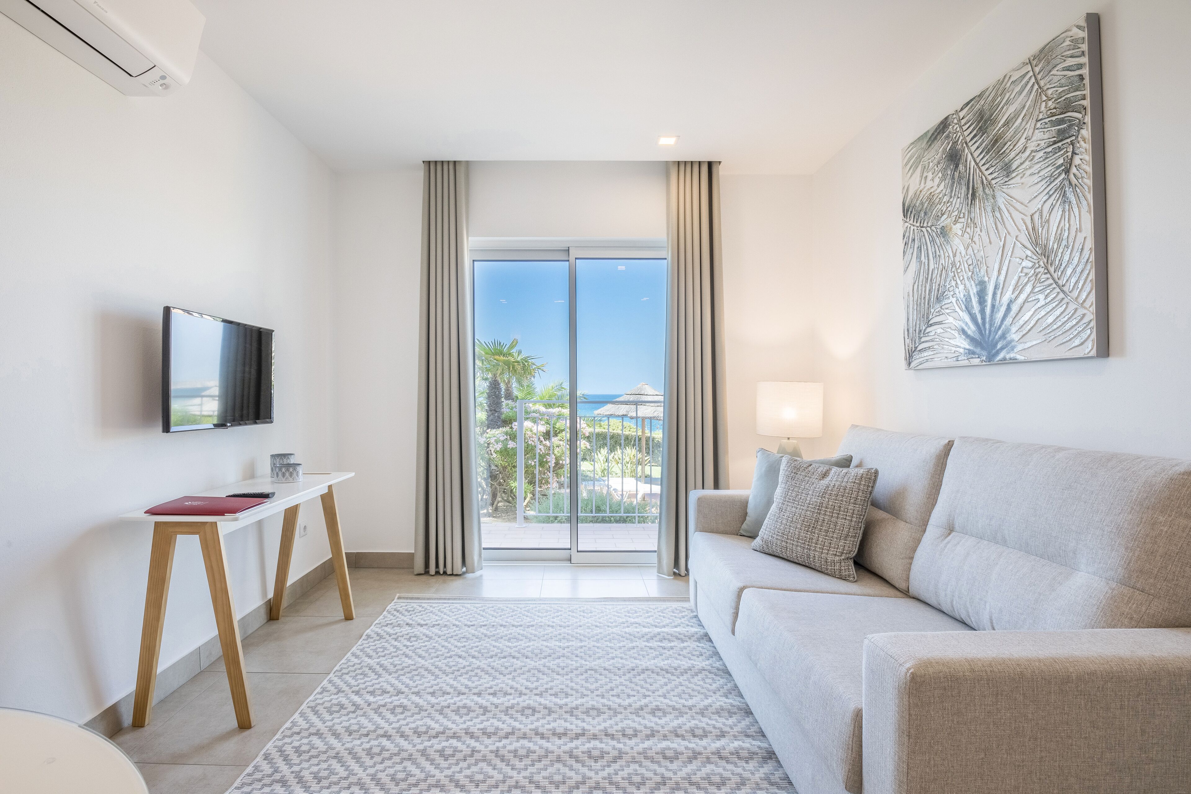 premium studio, sea view, sea facing | living area | 28-inch flat-screen tv with cable channels, tv, heated floors