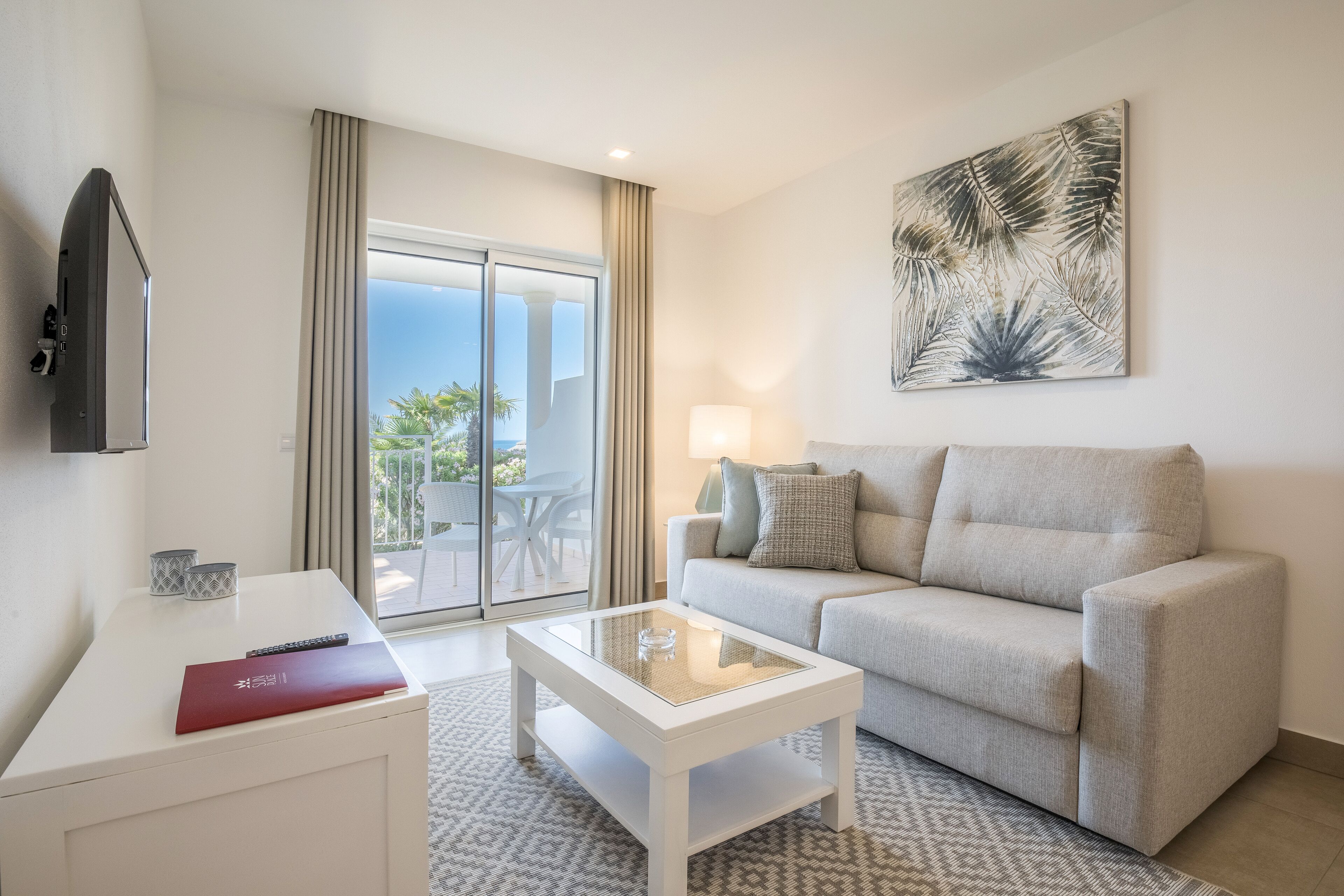 premium apartment, 1 bedroom, beach view, sea facing | living room | 28-inch flat-screen tv with cable channels, tv, heated floors