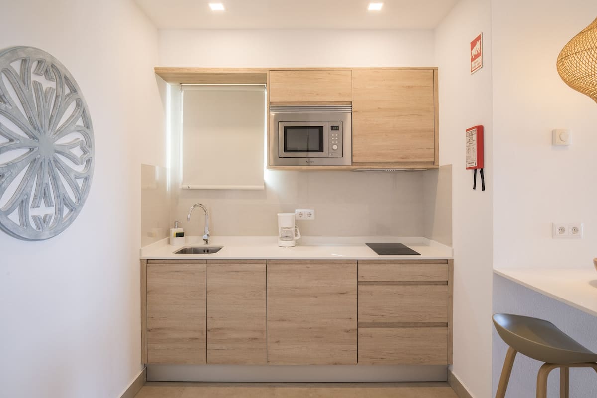 deluxe studio, beach view, sea facing | private kitchenette | fridge, microwave, stovetop, coffee/tea maker