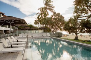 Outdoor pool, open 8:00 AM to 8:00 PM, pool umbrellas, pool loungers