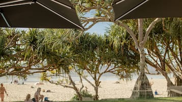 Outdoor pool, open 8:00 AM to 8:00 PM, pool umbrellas, pool loungers