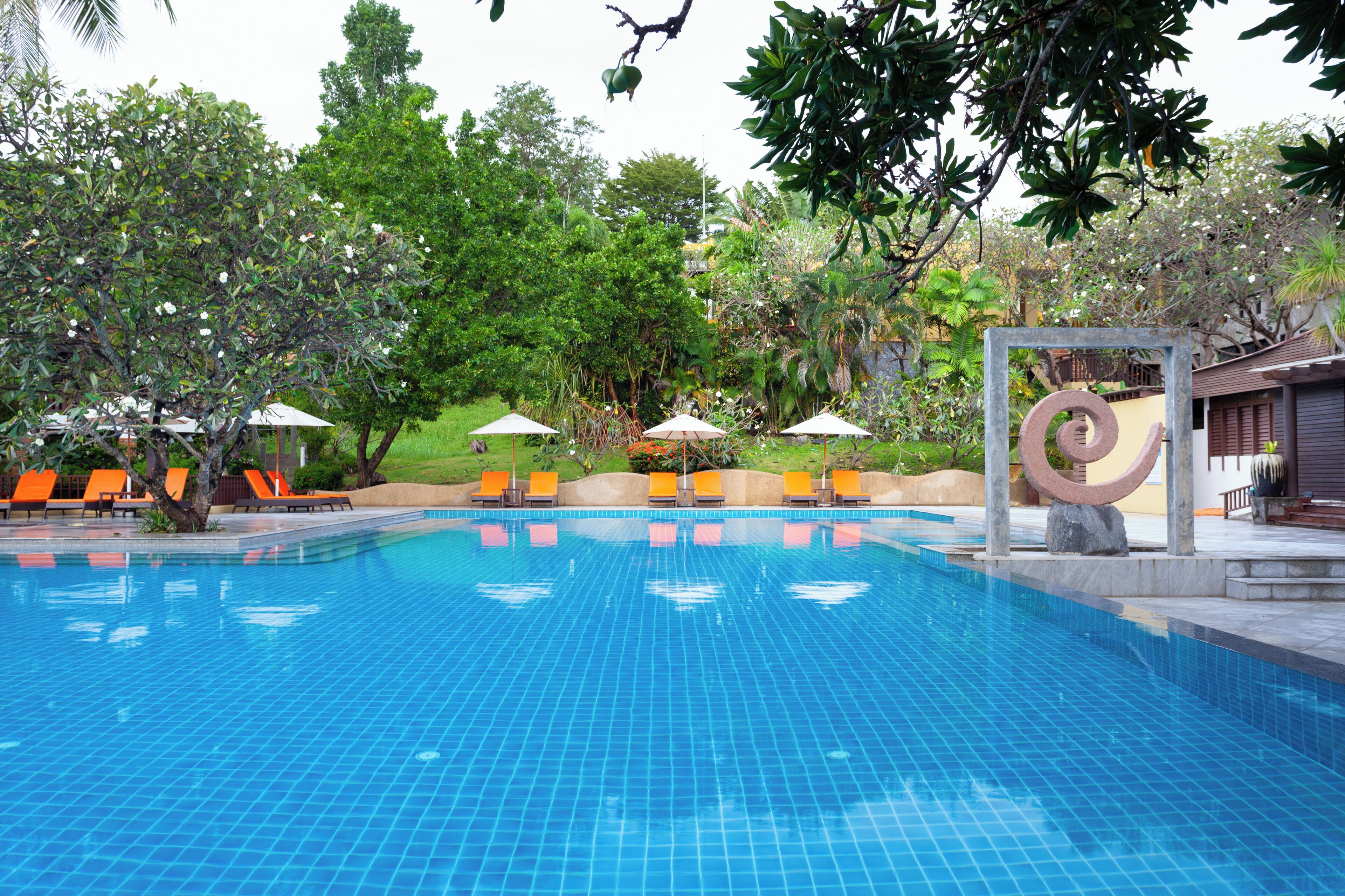 outdoor pool, open 7:00 am to 6:00 pm, pool umbrellas, pool loungers