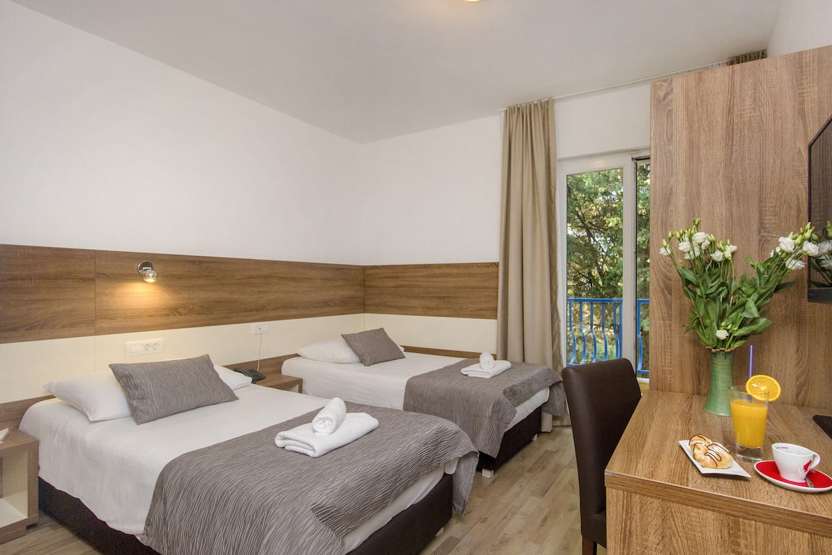 Standard Room, Balcony | 1 bedroom, individually furnished, desk, laptop workspace