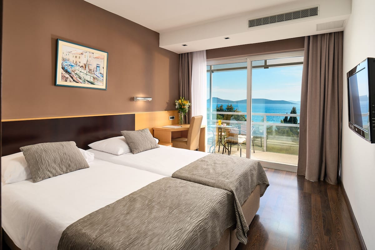 Junior Suite, Sea View | 1 bedroom, individually furnished, desk, laptop workspace